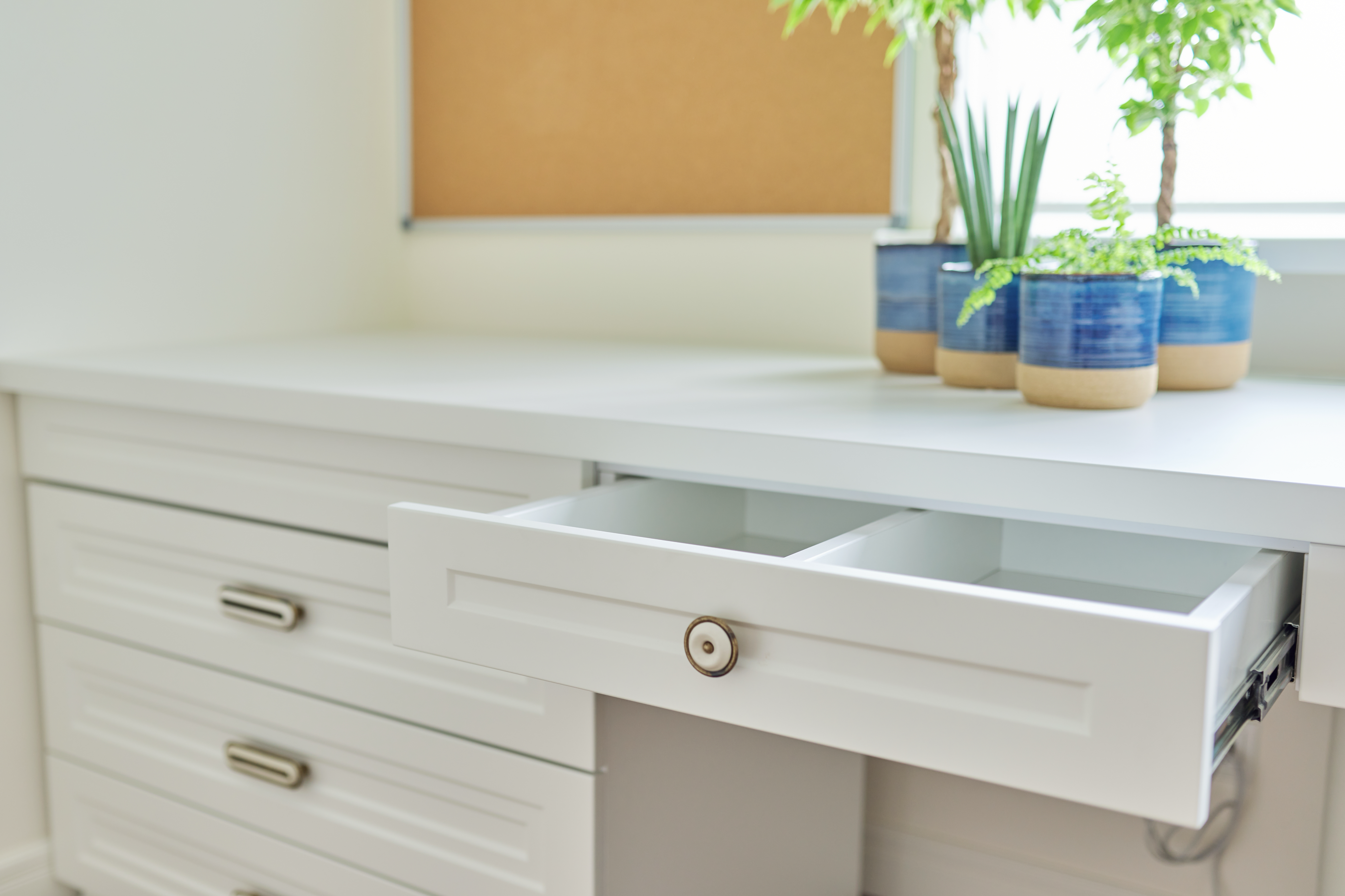 Soft white kitchen cabinetry.