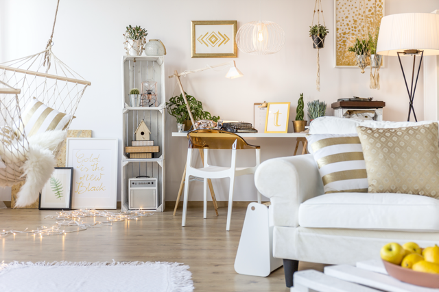 Elegant gold-themed cozy living space.